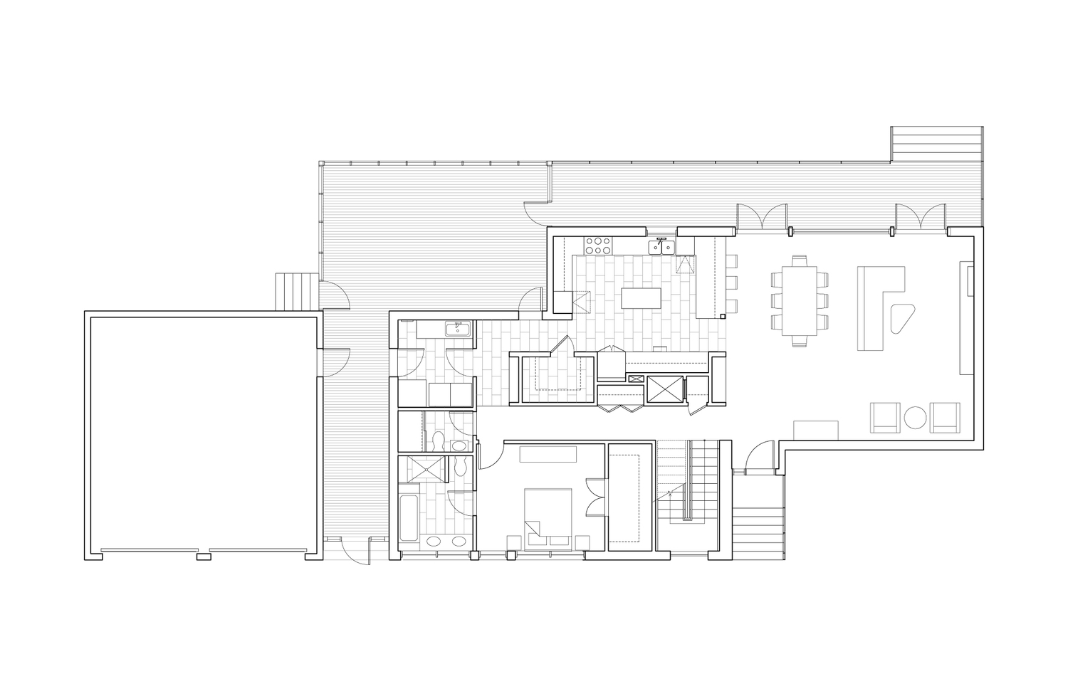 First floor plan showing the open kitchen-dining-living volume to the lake side, the first-floor master suite, the breezeway connecting the detached garage at left, and the deck and screened porch extending toward the lake